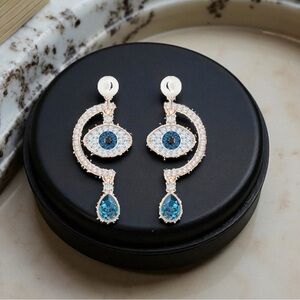 Swarovski Luckily Evil Eye Pierced Earrings in Rose Gold Plated Metal